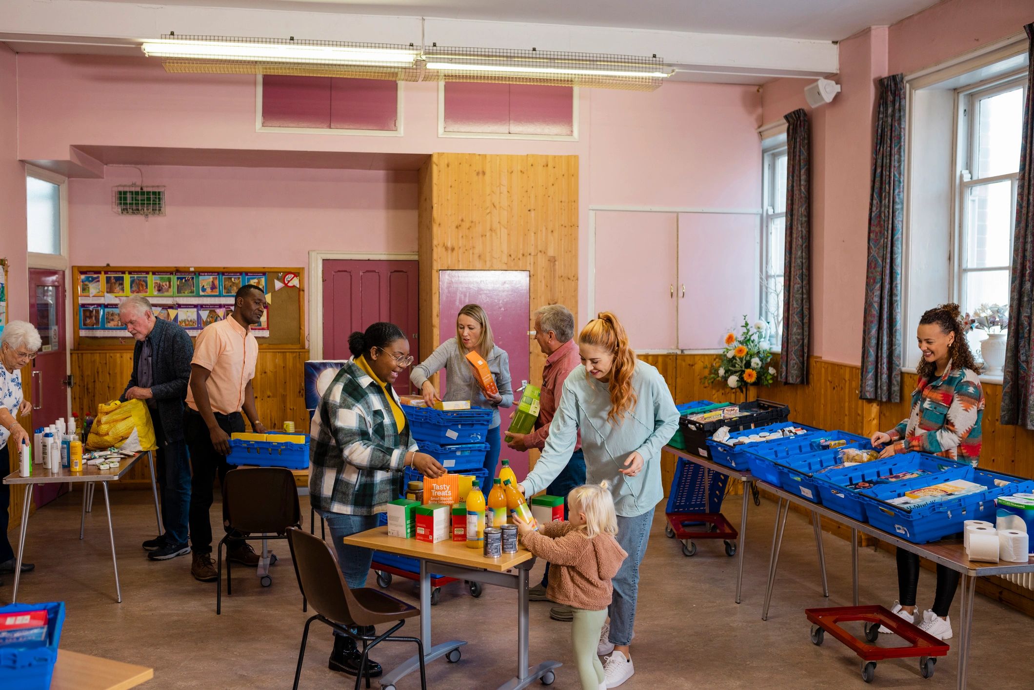 Community volunteers organizing materials together