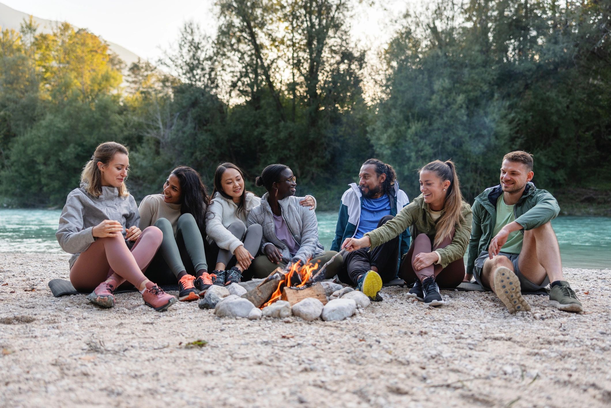 Group gathering outdoors in a natural setting
